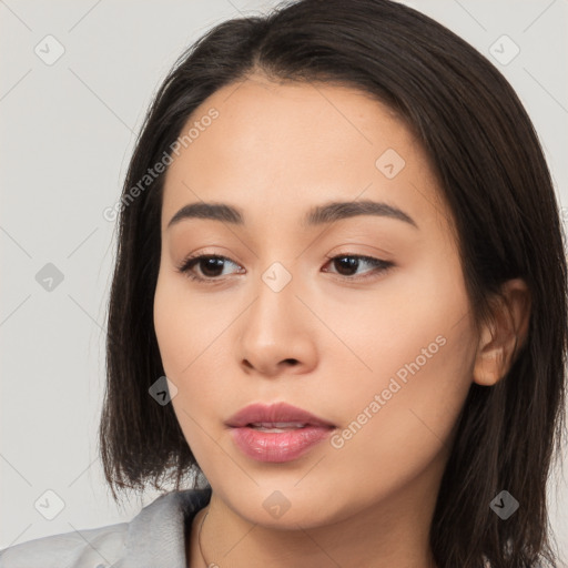 Neutral white young-adult female with long  brown hair and brown eyes