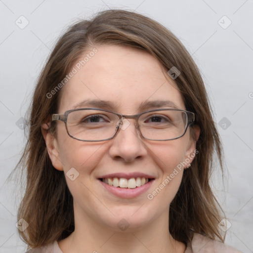 Joyful white adult female with medium  brown hair and grey eyes