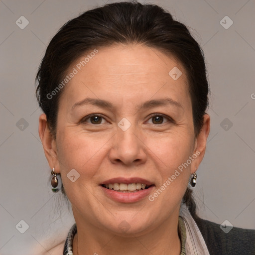 Joyful white adult female with short  brown hair and brown eyes