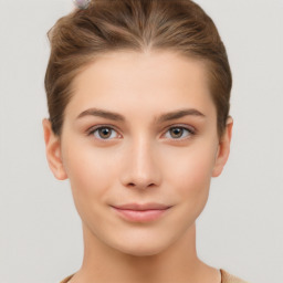 Neutral white young-adult female with short  brown hair and brown eyes