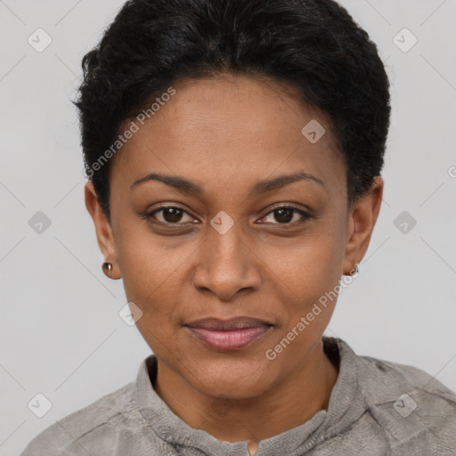 Joyful black young-adult female with short  black hair and brown eyes