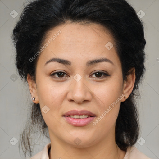 Joyful latino young-adult female with medium  brown hair and brown eyes