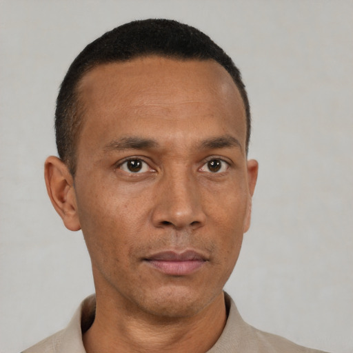 Neutral black adult male with short  black hair and brown eyes