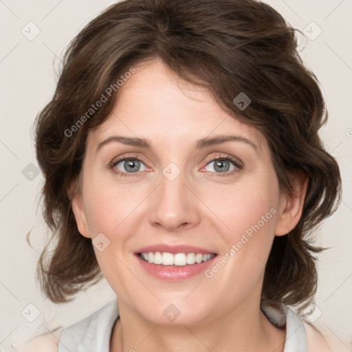 Joyful white young-adult female with medium  brown hair and green eyes