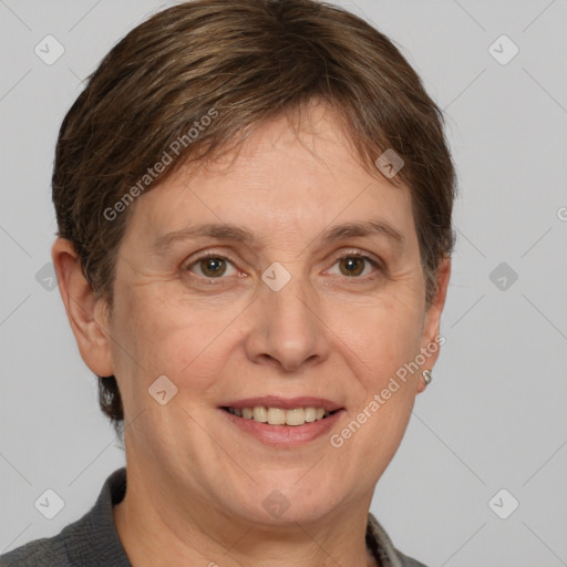 Joyful white adult female with short  brown hair and grey eyes