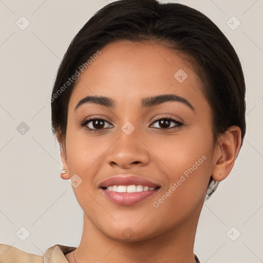 Joyful latino young-adult female with short  brown hair and brown eyes