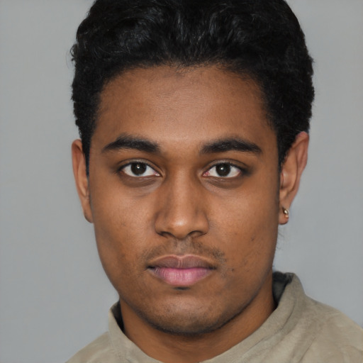 Neutral black young-adult male with short  black hair and brown eyes