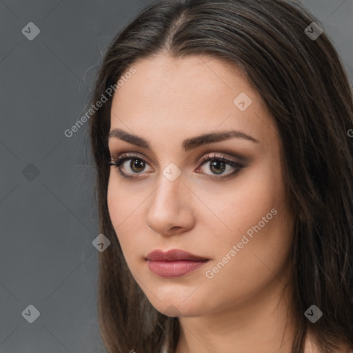 Neutral white young-adult female with long  brown hair and brown eyes