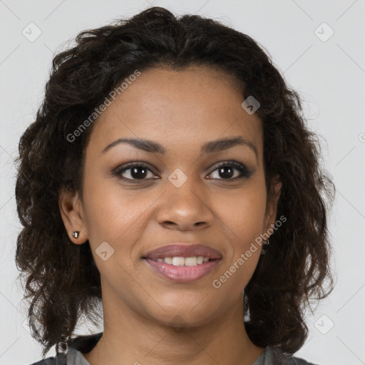 Joyful black young-adult female with medium  brown hair and brown eyes