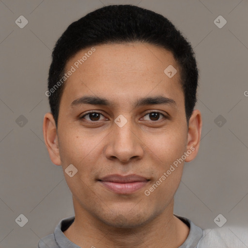 Joyful latino young-adult male with short  brown hair and brown eyes