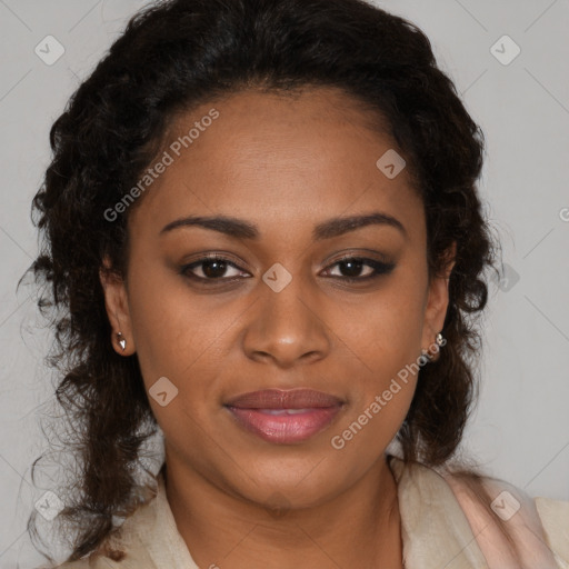 Joyful black young-adult female with long  brown hair and brown eyes