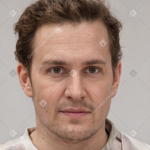 Joyful white adult male with short  brown hair and grey eyes