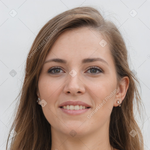 Joyful white young-adult female with long  brown hair and grey eyes