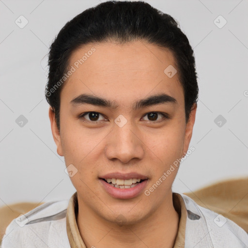 Joyful latino young-adult male with short  black hair and brown eyes