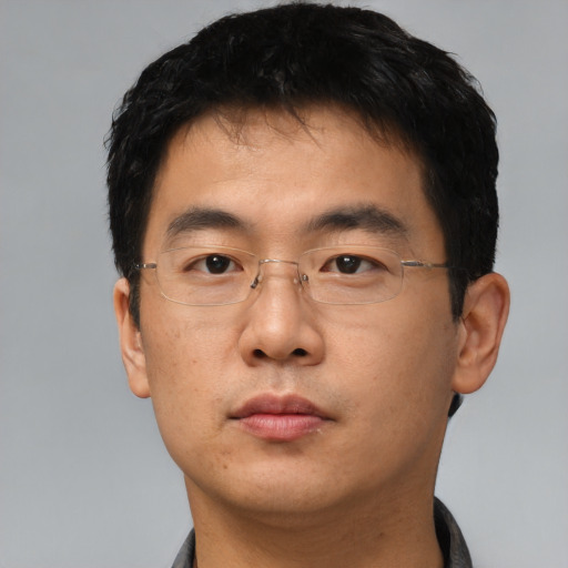 Neutral asian young-adult male with short  black hair and brown eyes