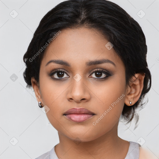 Joyful latino young-adult female with medium  brown hair and brown eyes