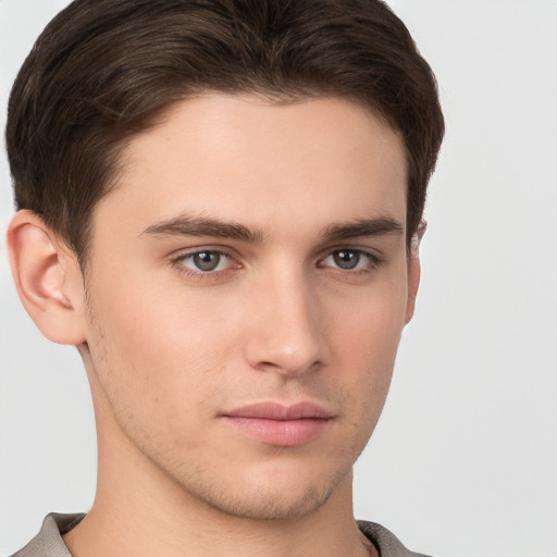 Neutral white young-adult male with short  brown hair and brown eyes