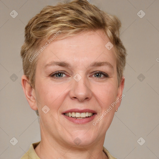 Joyful white adult female with short  brown hair and grey eyes