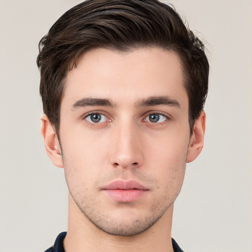 Neutral white young-adult male with short  brown hair and brown eyes