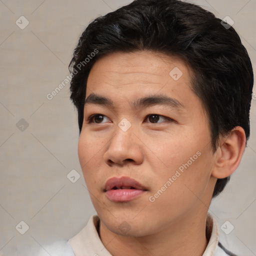 Neutral asian young-adult male with short  brown hair and brown eyes