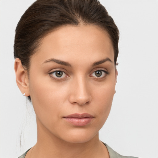 Neutral white young-adult female with medium  brown hair and brown eyes