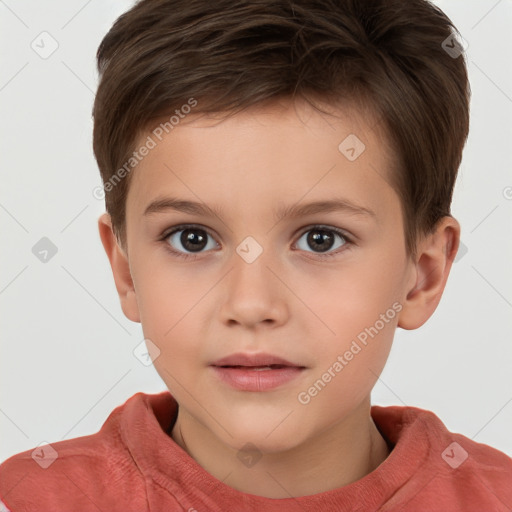 Joyful white child male with short  brown hair and brown eyes