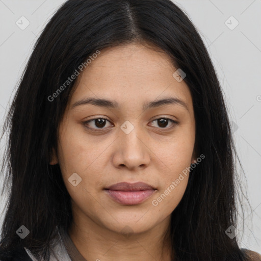 Joyful asian young-adult female with long  brown hair and brown eyes