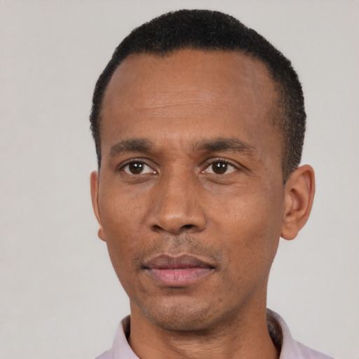 Neutral black adult male with short  black hair and brown eyes
