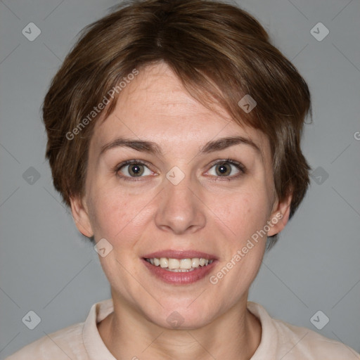 Joyful white adult female with medium  brown hair and grey eyes