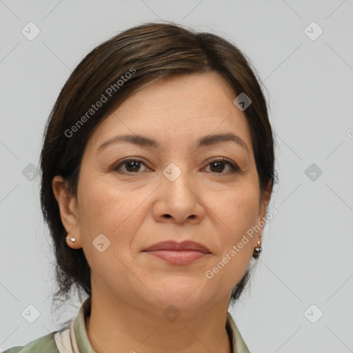 Joyful white adult female with medium  brown hair and brown eyes