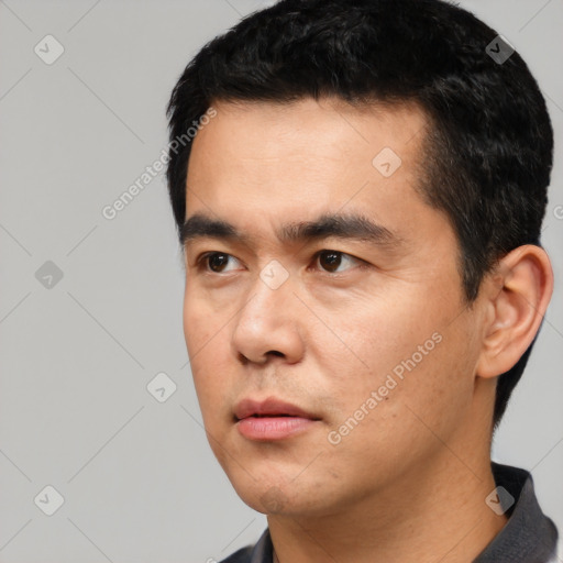 Neutral asian young-adult male with short  black hair and brown eyes