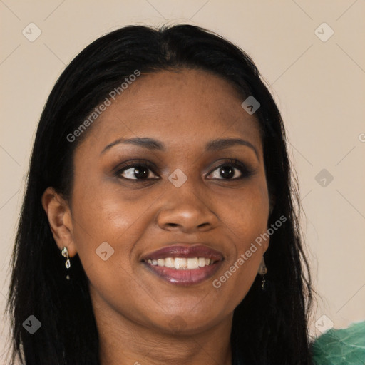 Joyful black young-adult female with long  brown hair and brown eyes