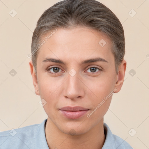 Joyful white young-adult female with short  brown hair and brown eyes