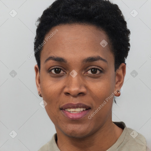 Joyful black young-adult female with short  black hair and brown eyes