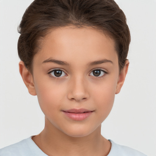 Joyful white child female with short  brown hair and brown eyes