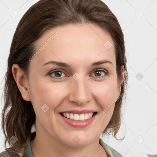 Joyful white young-adult female with medium  brown hair and grey eyes