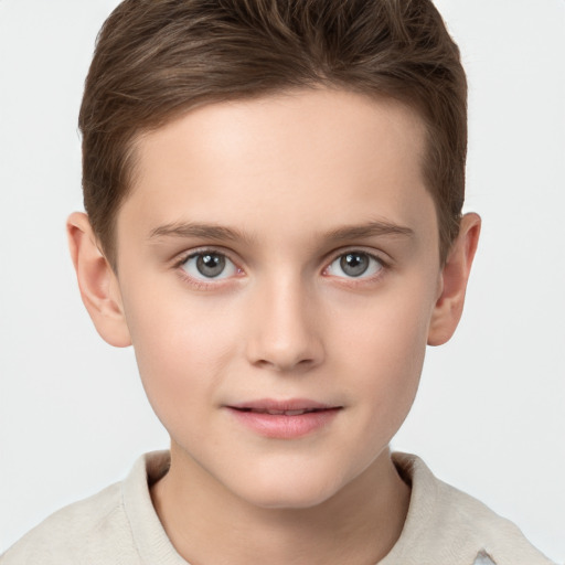 Joyful white child male with short  brown hair and brown eyes