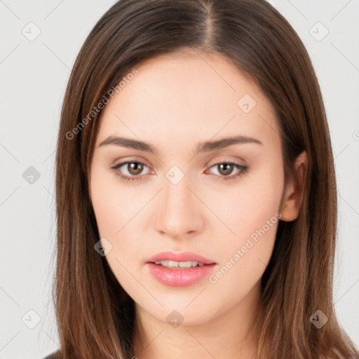 Neutral white young-adult female with long  brown hair and brown eyes