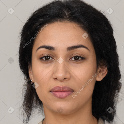 Joyful latino young-adult female with medium  brown hair and brown eyes