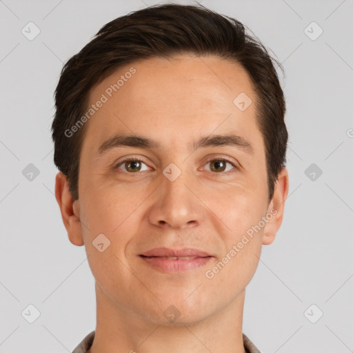 Joyful white adult male with short  brown hair and brown eyes