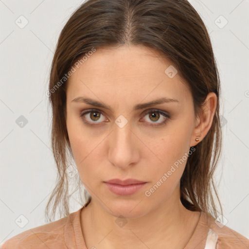 Neutral white young-adult female with medium  brown hair and brown eyes