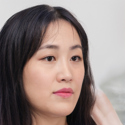 Neutral asian young-adult female with long  brown hair and brown eyes