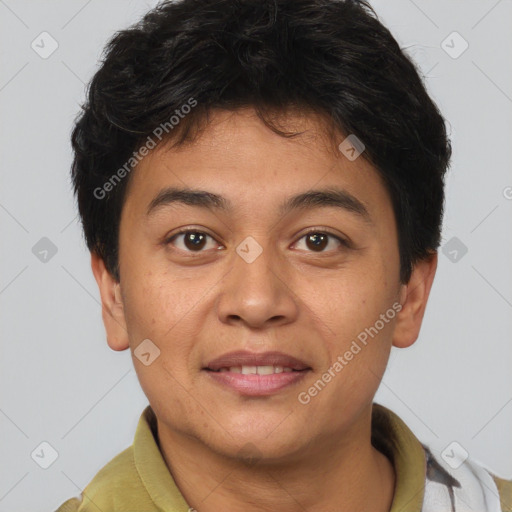 Joyful asian young-adult male with short  brown hair and brown eyes