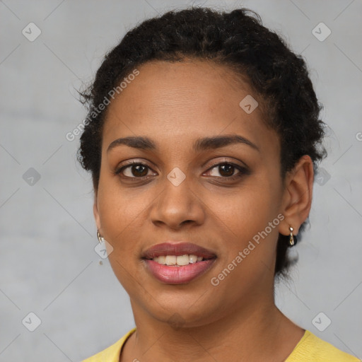 Joyful latino young-adult female with short  brown hair and brown eyes