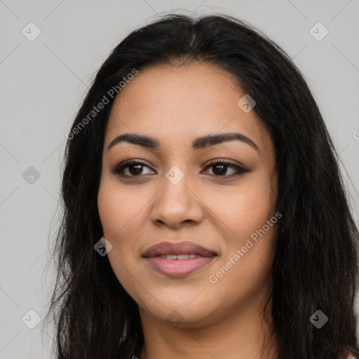 Joyful latino young-adult female with long  black hair and brown eyes