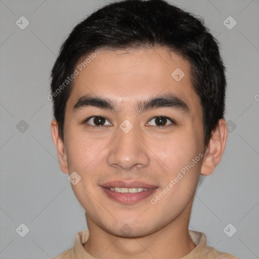 Joyful white young-adult male with short  black hair and brown eyes