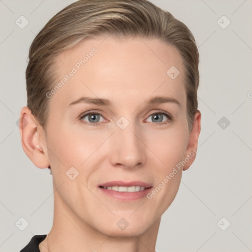 Joyful white young-adult female with short  brown hair and grey eyes