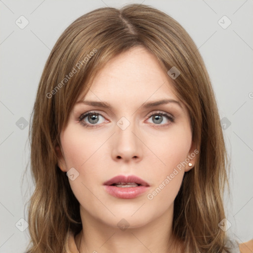 Neutral white young-adult female with medium  brown hair and grey eyes