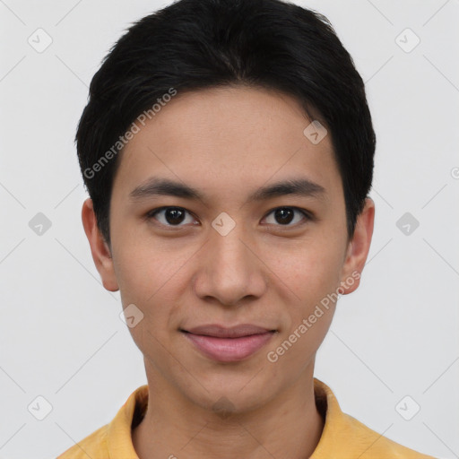 Joyful asian young-adult male with short  brown hair and brown eyes