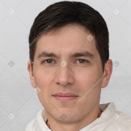 Joyful white young-adult male with short  brown hair and brown eyes